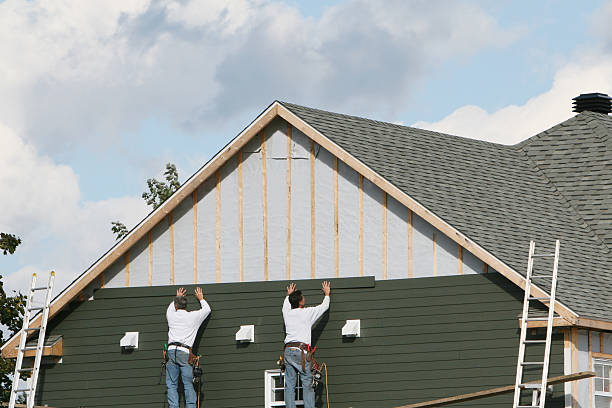 Professional Siding technician working in Lewisville, NC